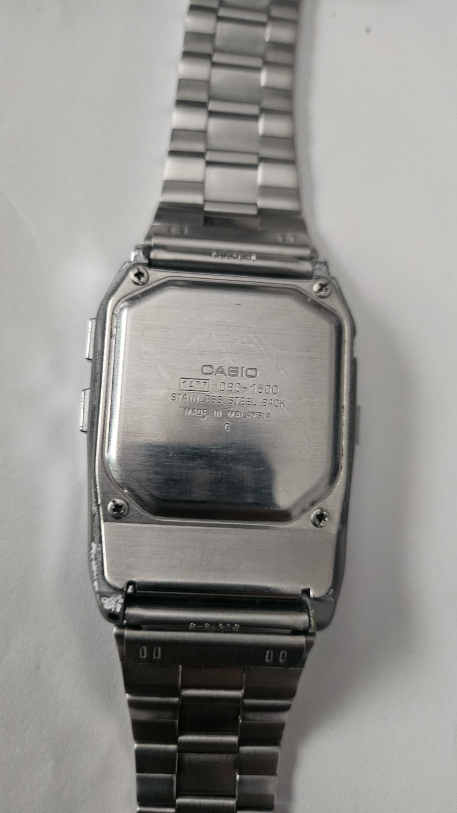 Casio Data Bank 150 1477 DBC-1500 Silver Tone Digital Watch