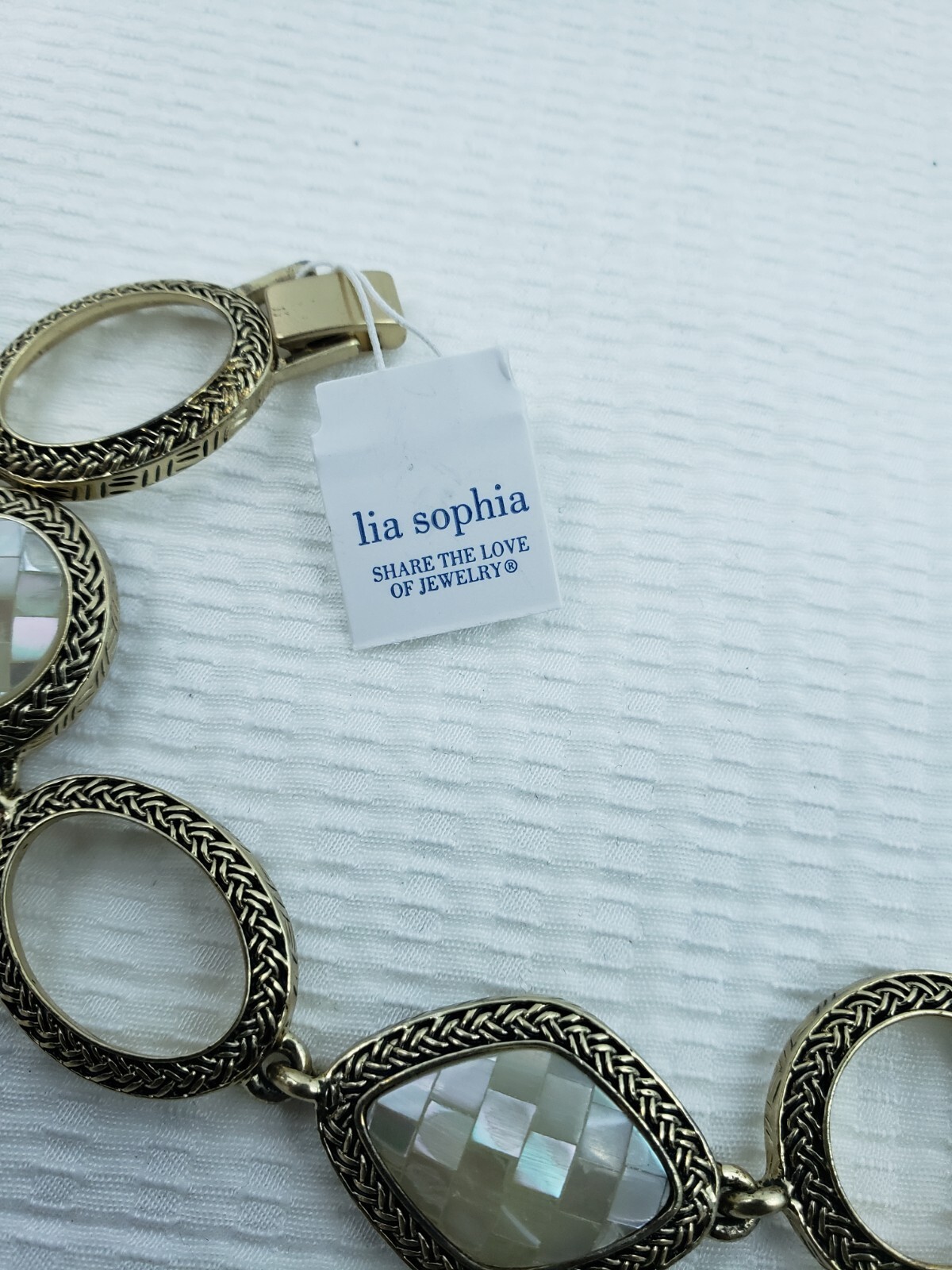 Lia Sophia Flexible Oval Linked Round Fold Over Closure Silver Bracelet 9″ Long