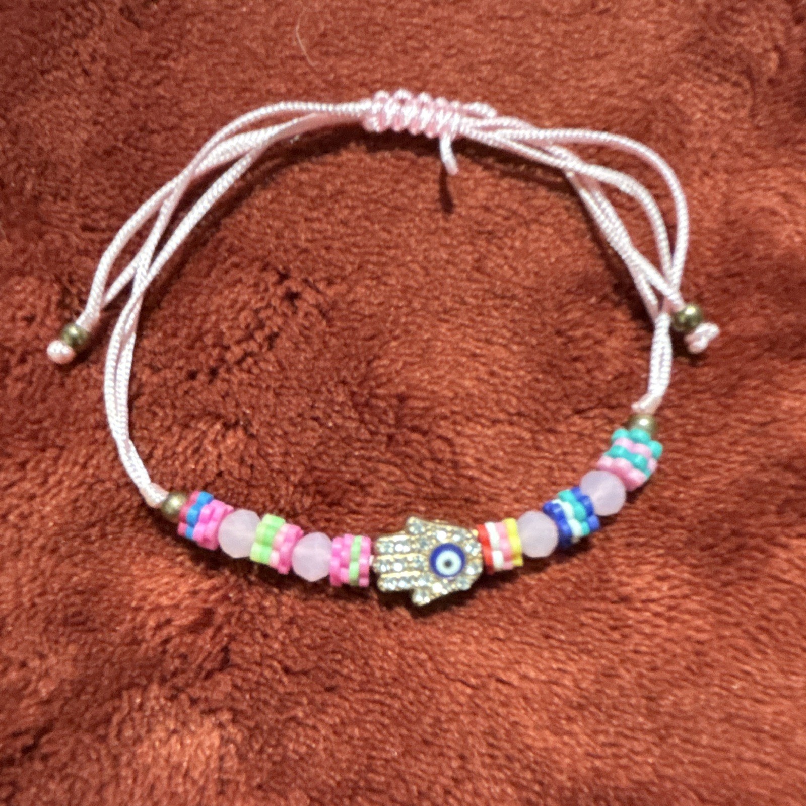 Eye In Hand Charm Bracelet with Beads and An Adjustable Length
