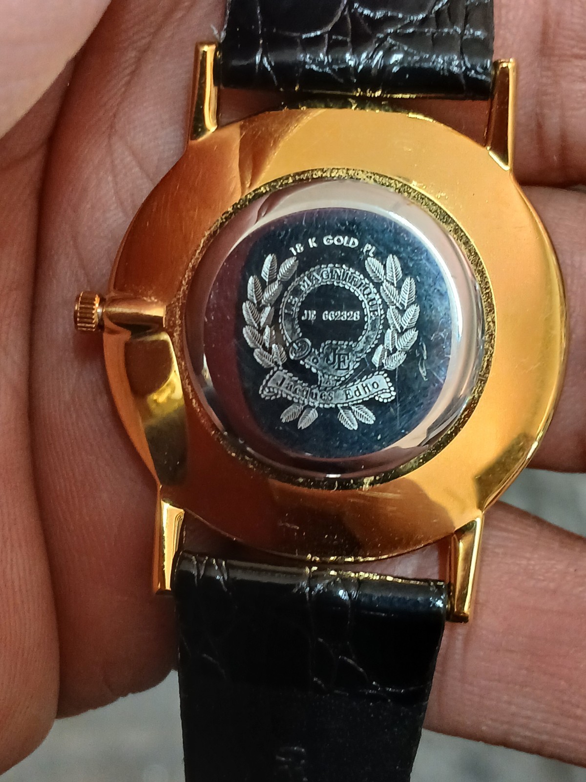 Jacques Edho Paris quartz dress watch featuring an 18k gold-plated case