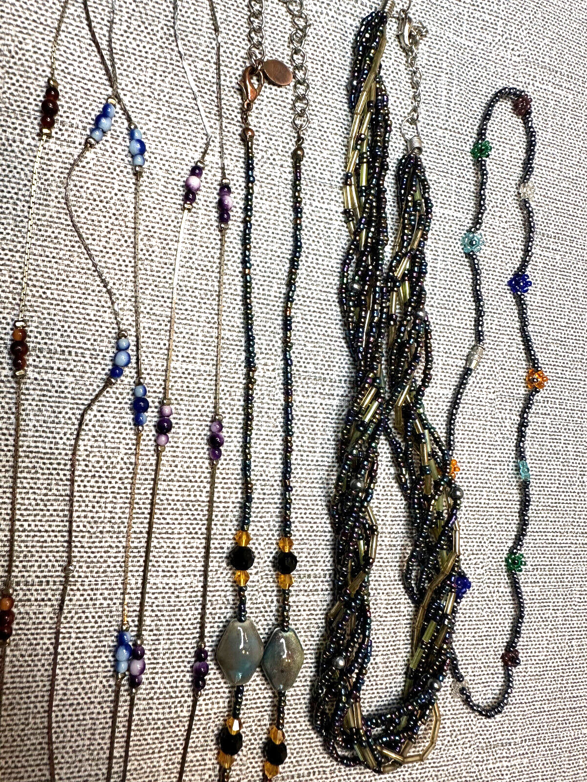 Lot of 9 Necklaces, 1 Matching Set of Earrings, Some Marked Korea