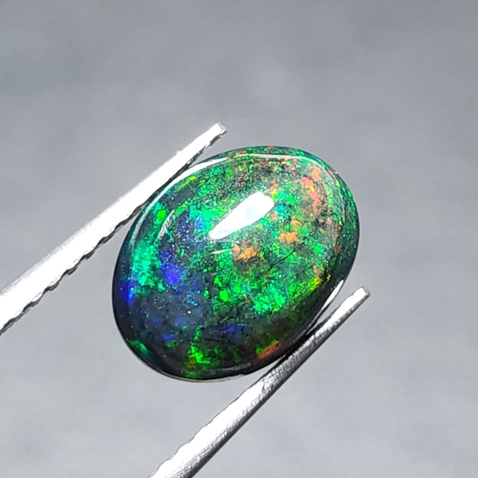 Natural Welo Black Opal Ethiopia Oval Cabochon Vivid Green Fire Gemstone 1.20Ct