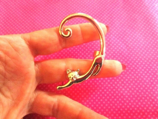 Stretching cat ear cuff climber
