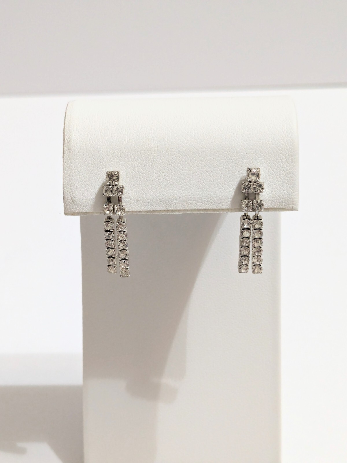 Silver Tone Layered Prong Set Rhinestone Stud/Drop Earrings. 1″. Modern.