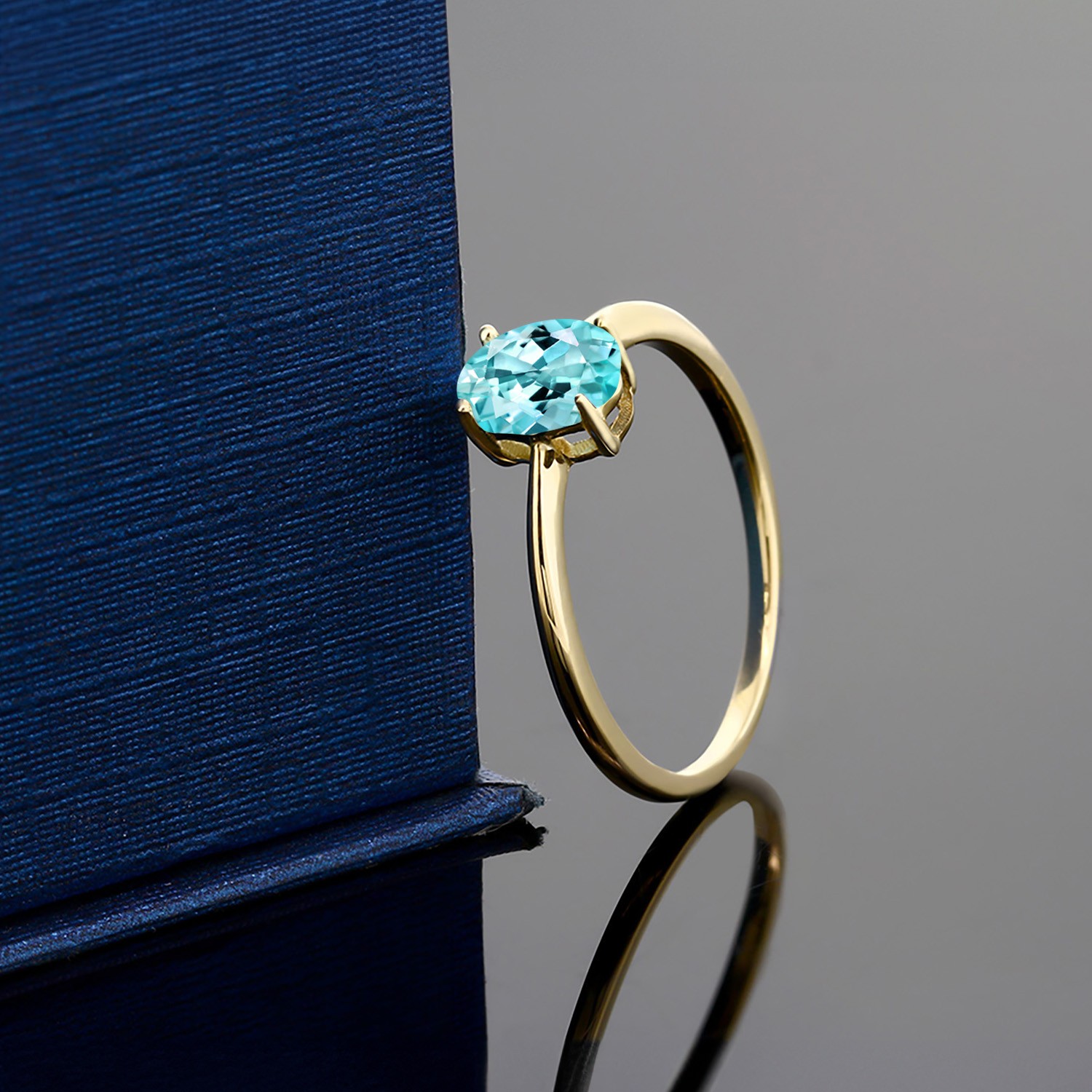 0.82 Ct Oval Blue Apatite 10K Yellow Gold Ring