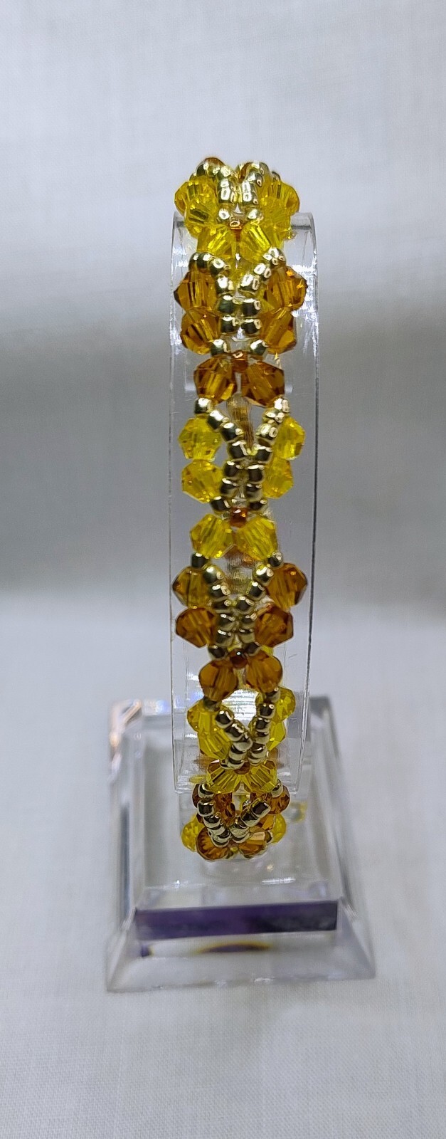 Handmade Beautiful Butterfly design bracelet in Honey, Yellow and Gold Colours