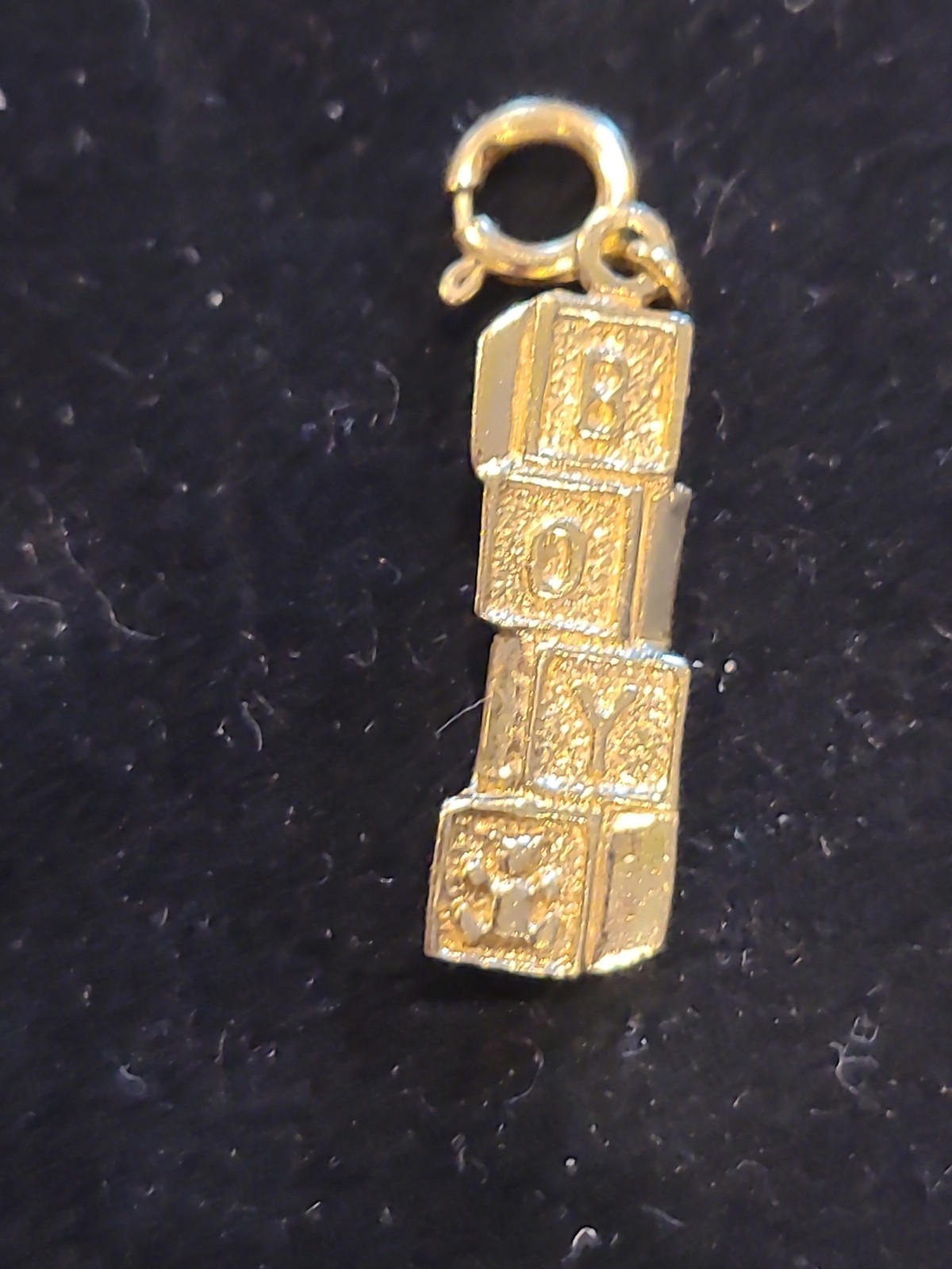 Fine jewelry BOY charm. 14 kt gold. 1.64 g. 7/8 in.
