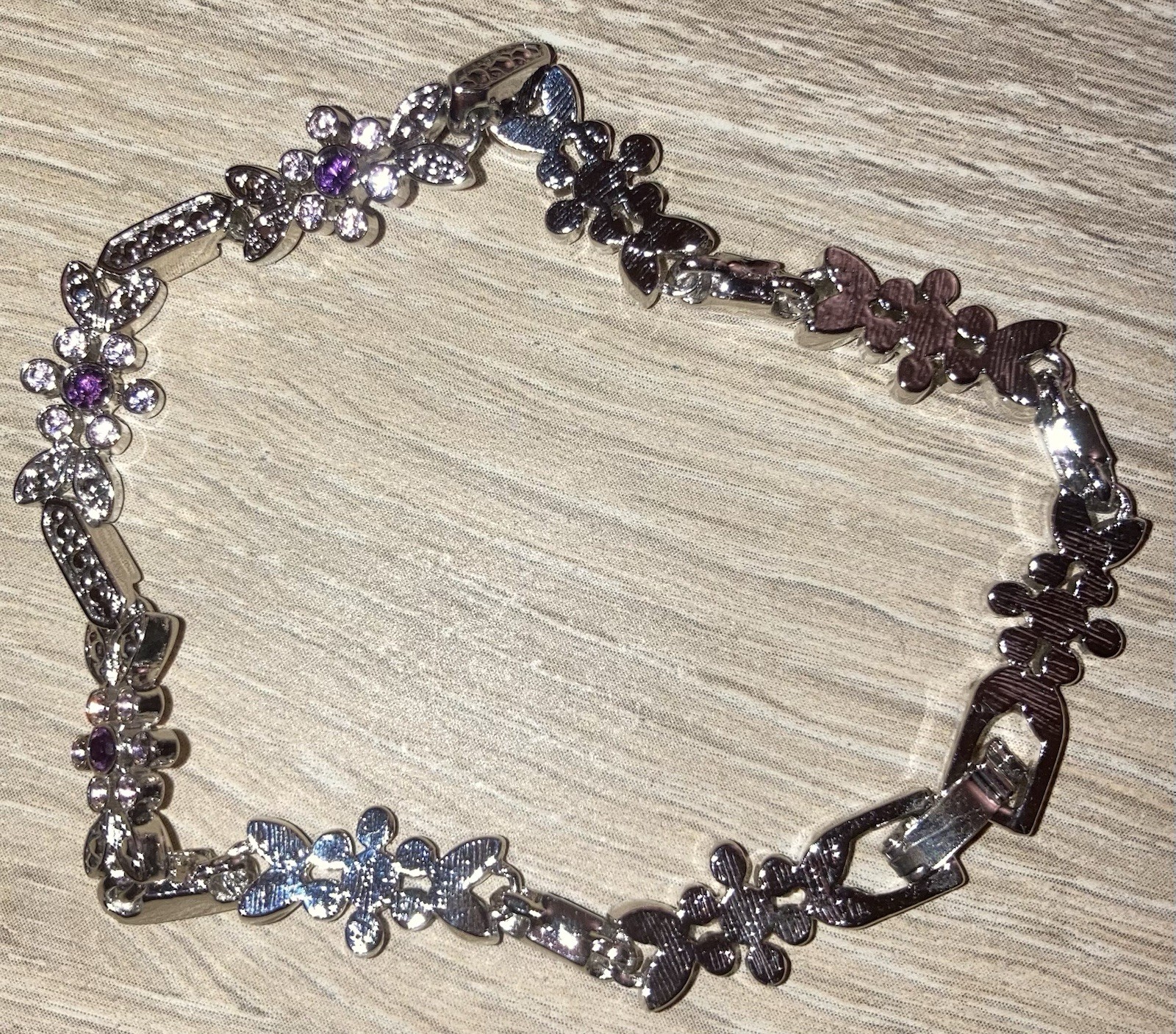 Floral Silver Colored Tennis Bracelet with Purple Round Stones