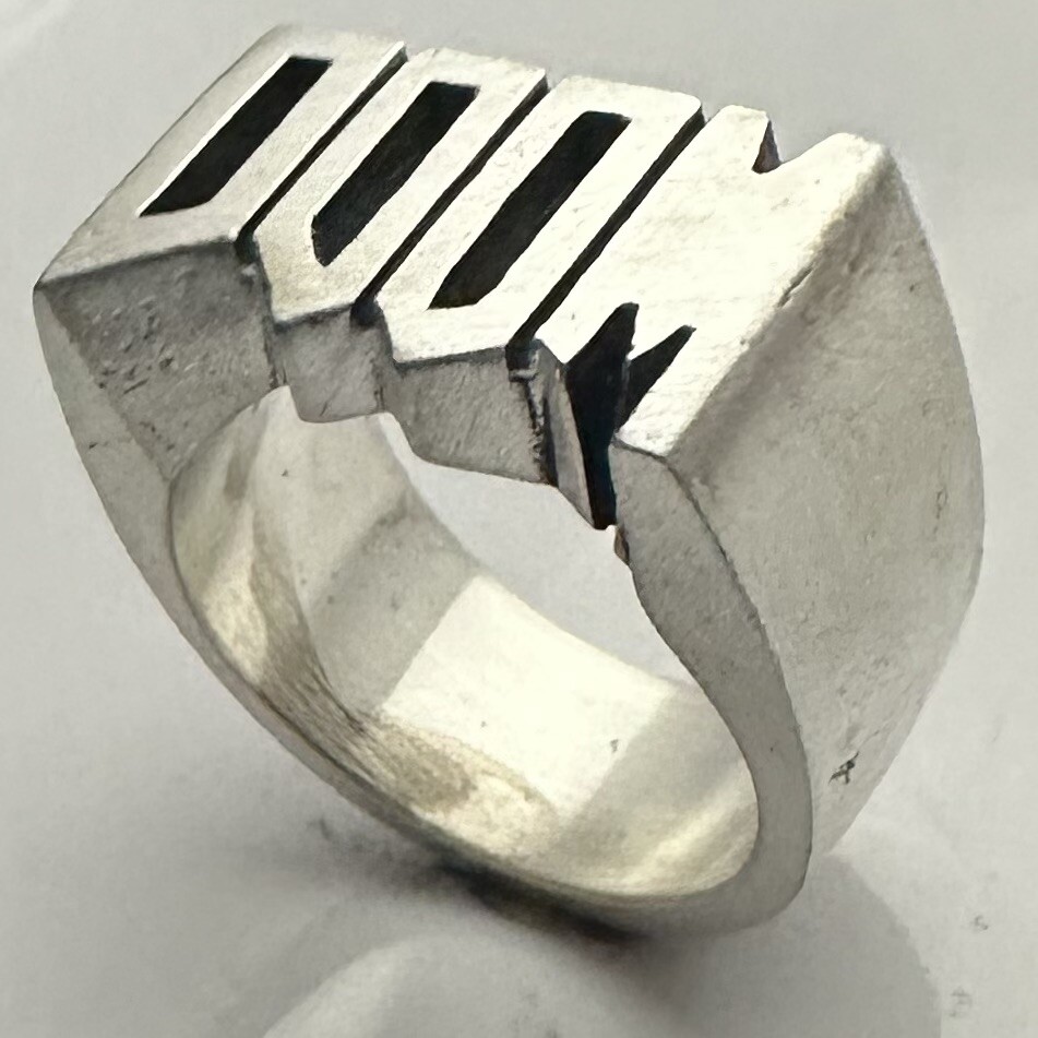 MJG STERLING SILVER DOOM RING. 23 GRAMS. BIKER. GUITAR PLAYER