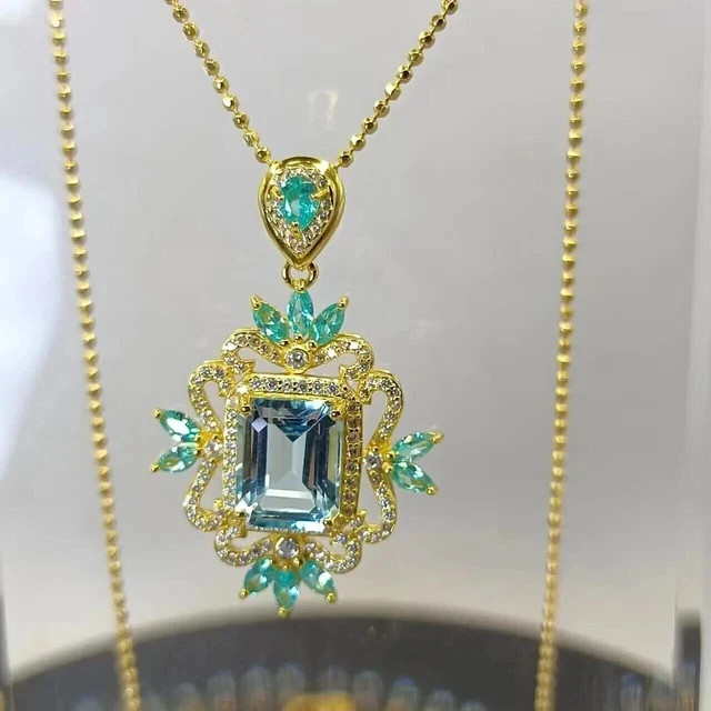 3 Ct Oval Lab Created Blue Topaz Women’s Art Deco Pendant 14K Yellow Gold Plated