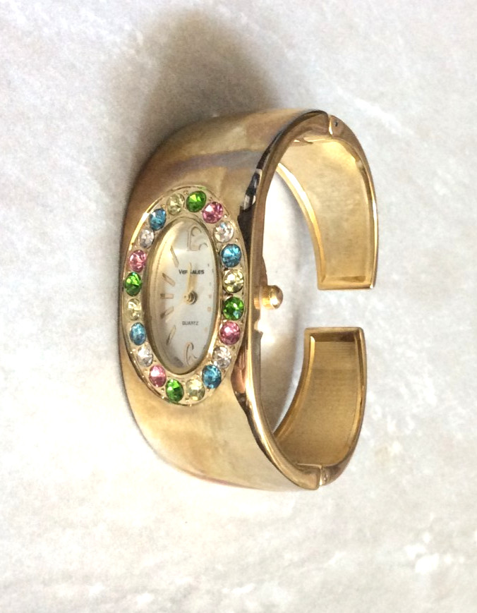 Varsales Women’s Watch Oval Silver Dial Gold Numbered Hours on Gold Bangle Band!