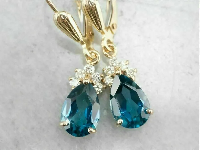 Sterling Silver Blue Teardrop Gemstone Dangle Earrings in Gold Finish