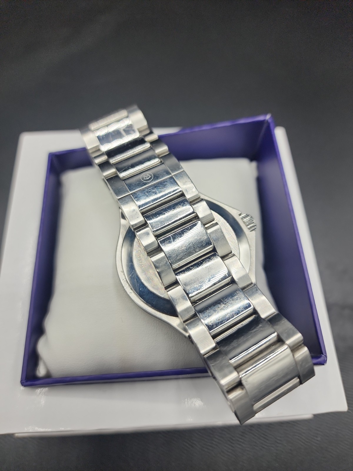 Movado Stainless Steel Defio Men’s Blue Museum Dial Dress Watch new battery