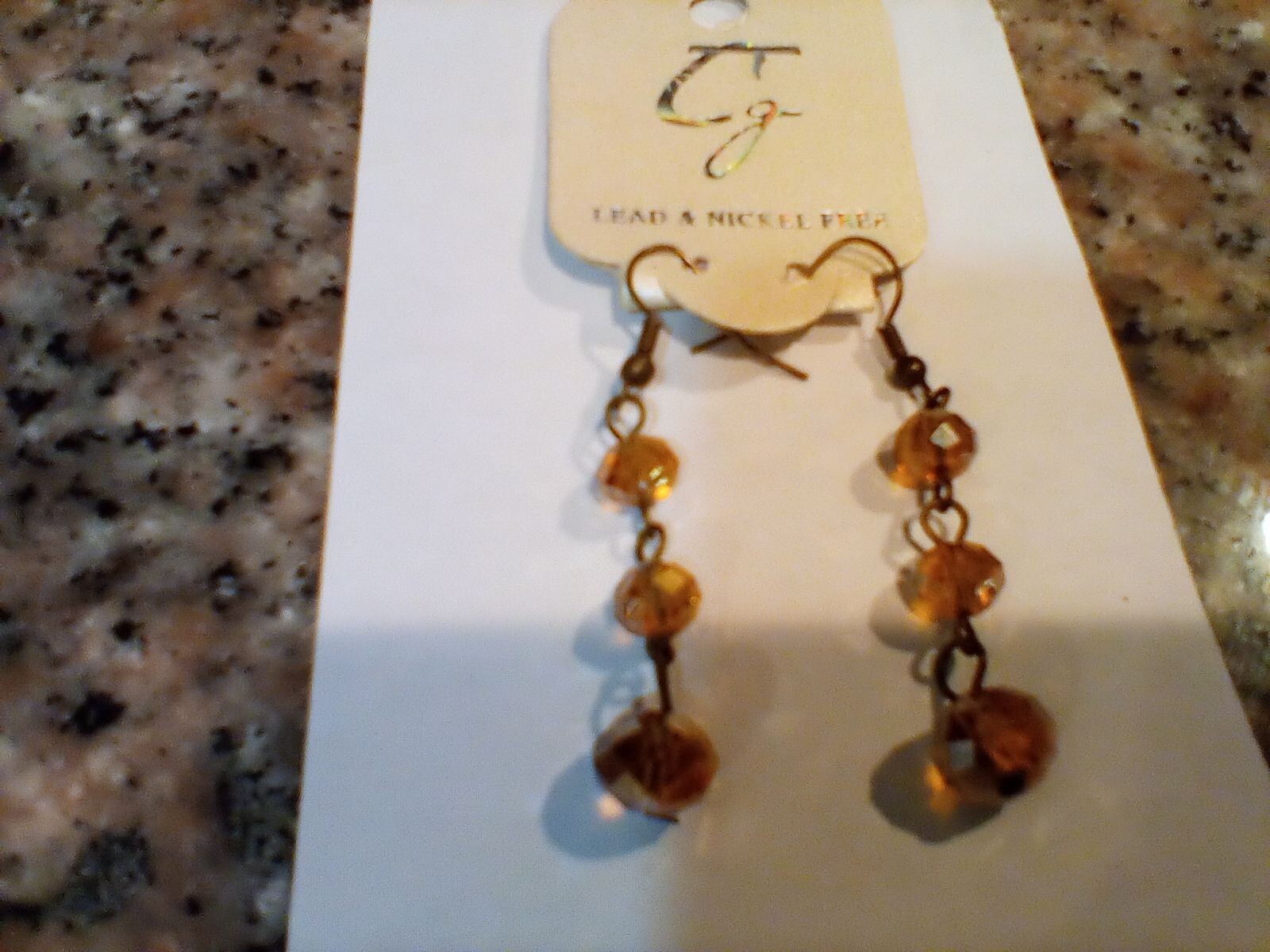 Hook Earrings Copper Inlaid, yellow stone. Lead and nickel free. China.