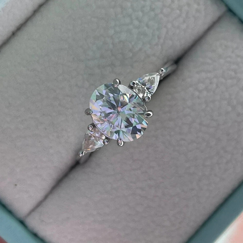 3.10 TCW Oval Cut Moissanite Three Stone Engagement Ring 14K White Gold Plated