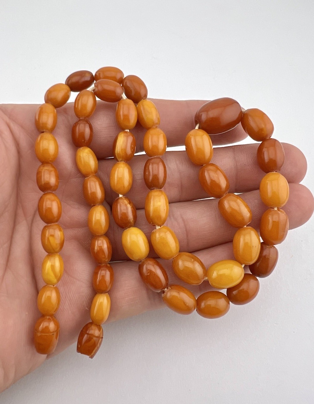 21.5g- Antique Butterscotch Egg Yolk Baltic Amber Swirl Oval Bead Necklace 21.5″