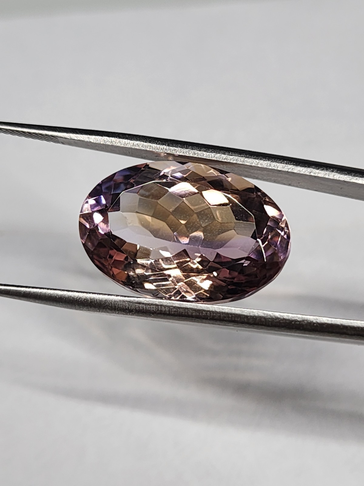 Natural Bolivian Ametrine 21.9ct Oval Cut BiColor Quartz 21.98×14.7×11.36 mm