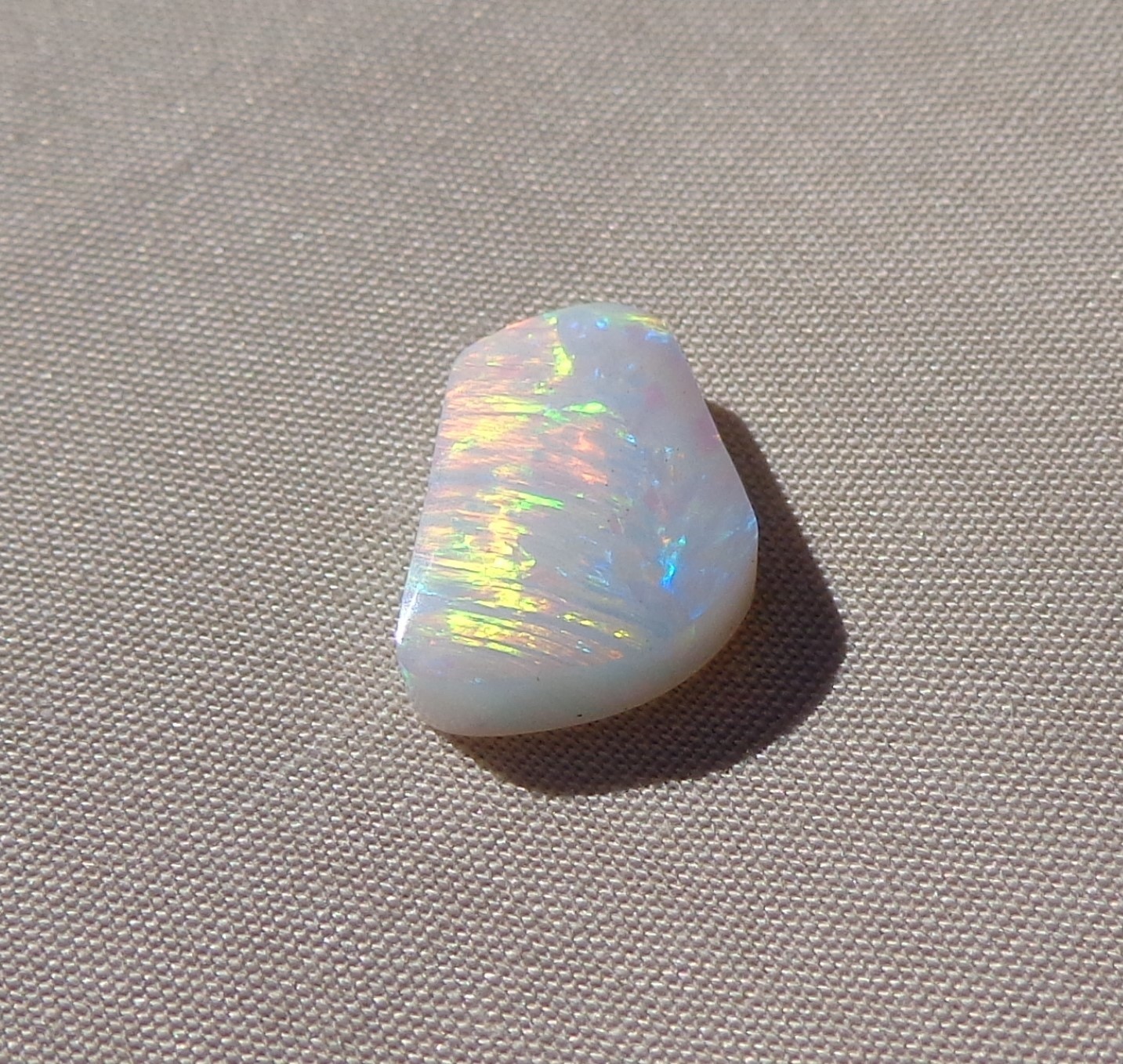 Spencer Idaho Opal Solid 9X15 mm with Unique Pattern and Red, Green, & Gold Fire