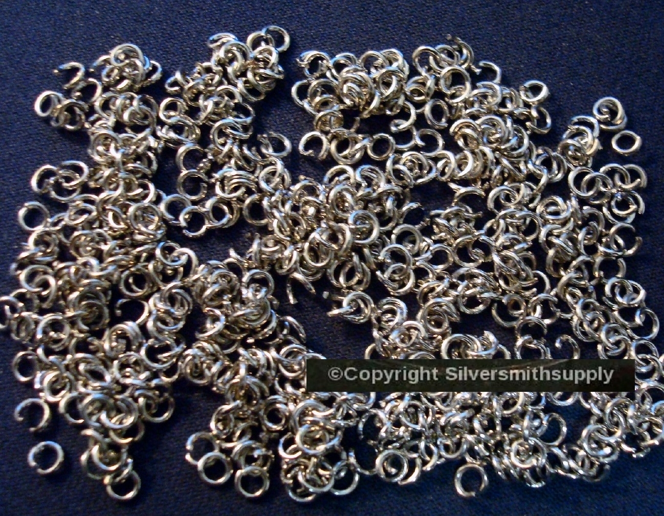 3mm (approximately) White gold pltd heavy ga jump rings 500 piece lot FPJ088