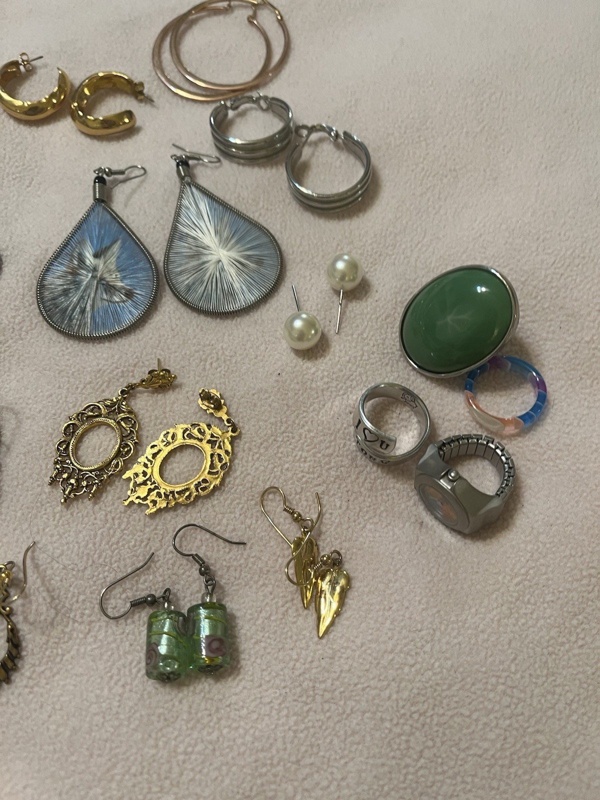 Mixed Lot Of 13 Pairs Of Earrings. 4 rings. Preowned