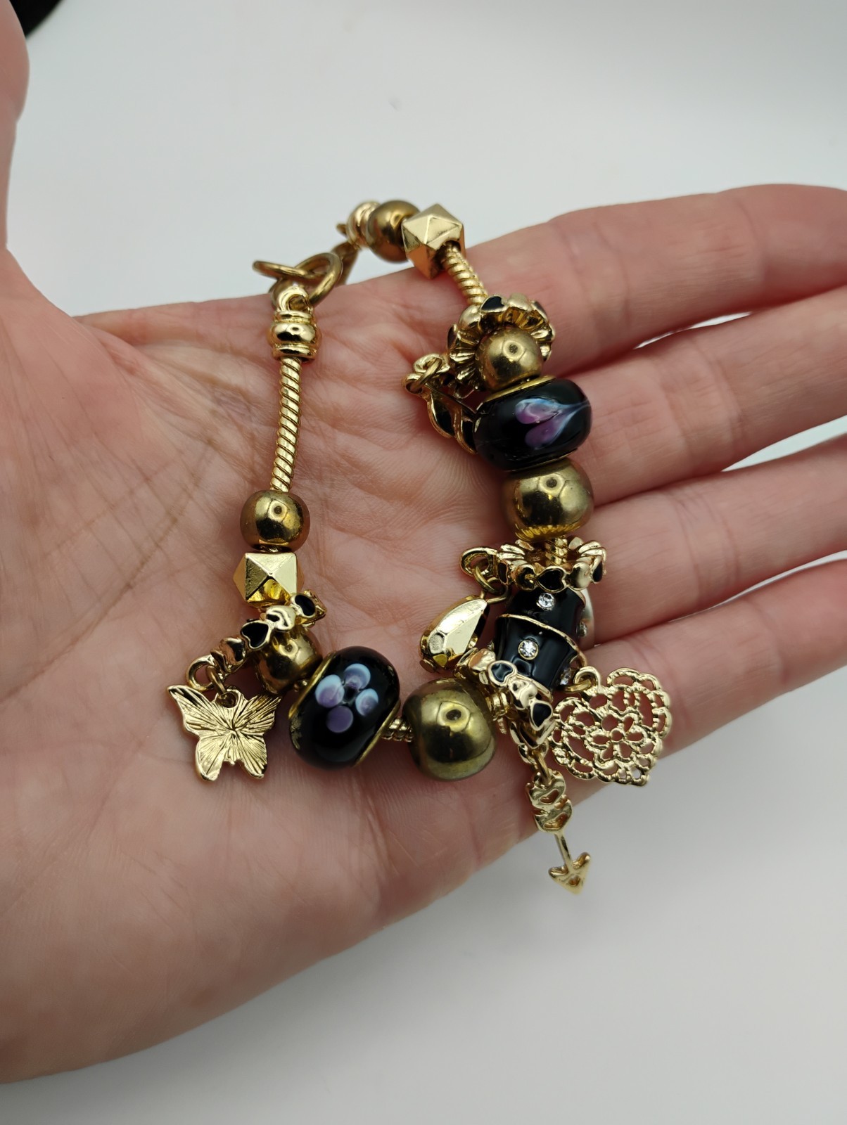 Landau Infinity Charm Bracelet Gold Tone Black Glass Beads Butterfly Arrow 7.5