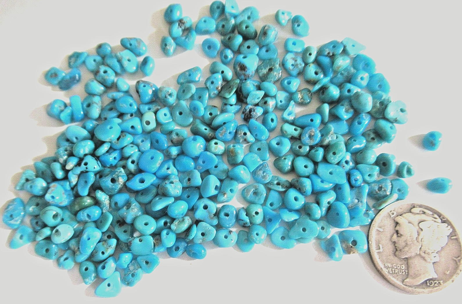 SLEEPING BEAUTY TURQUOISE 1/2 OZ DRILLED NUGGETS 4 X 3mm TO 7 X 4mm #606