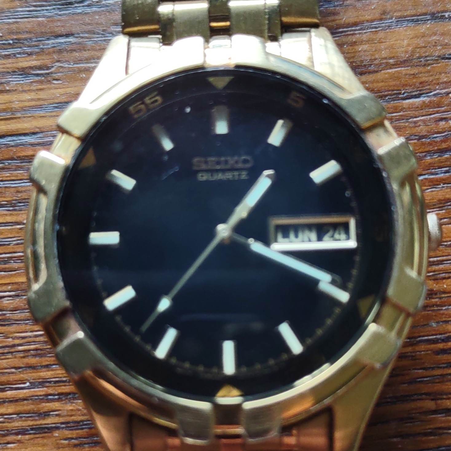Seiko Quartz Day/Date Black Dial Gold-Tone Stainless Steel Bracelet Watch