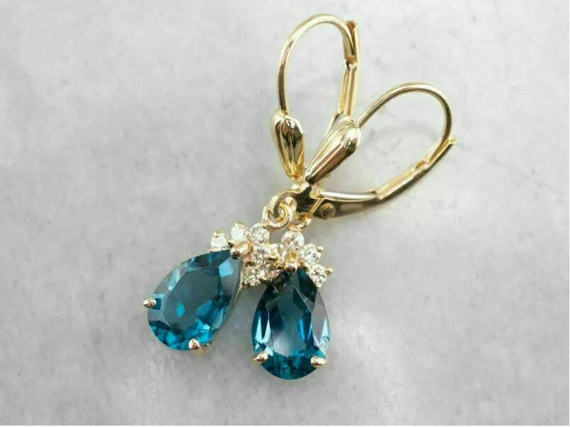 Sterling Silver Blue Teardrop Gemstone Dangle Earrings in Gold Finish