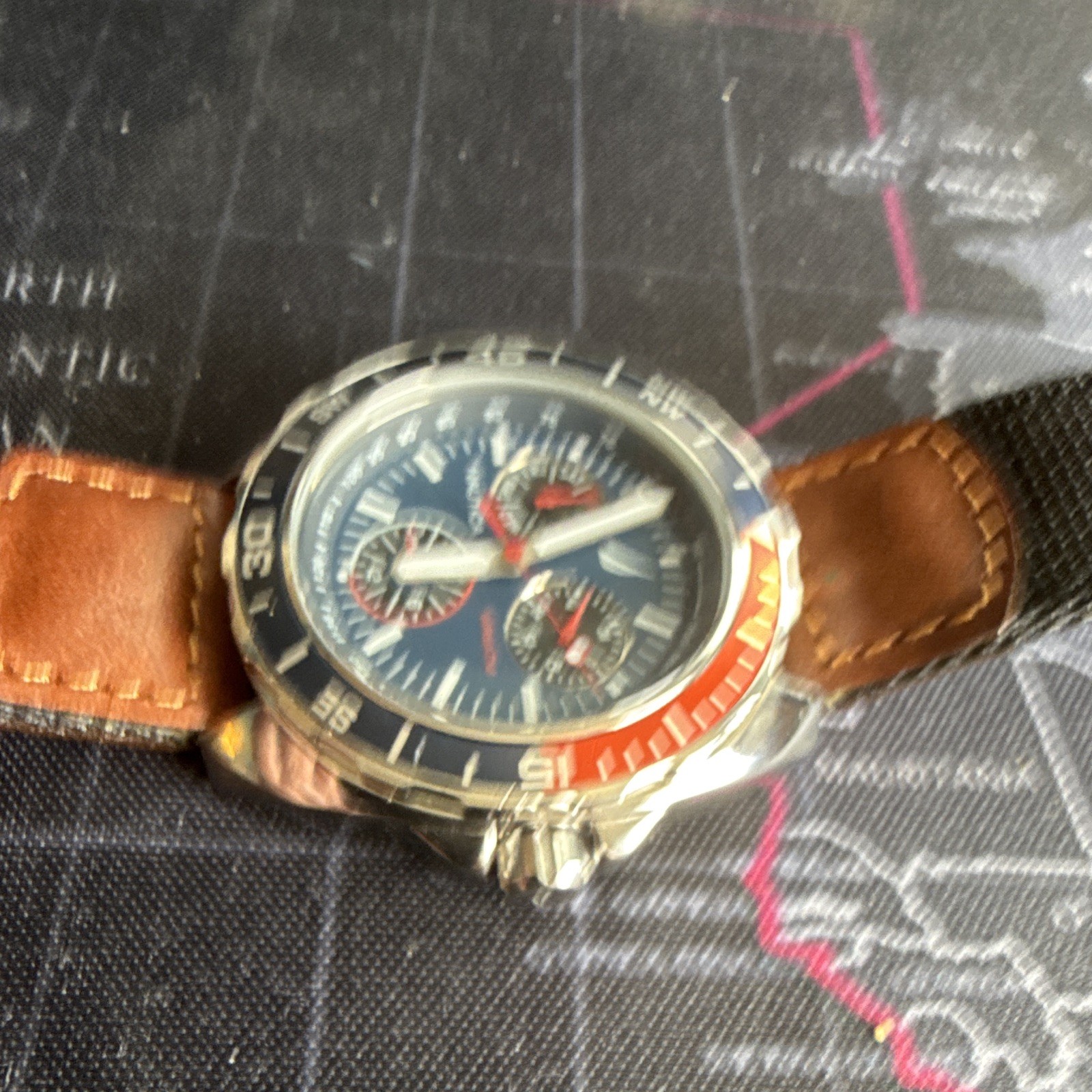 Nautica Men’s Quartz Sport Chronograph Tachymeter Blue Dial Red/Blue Bezel