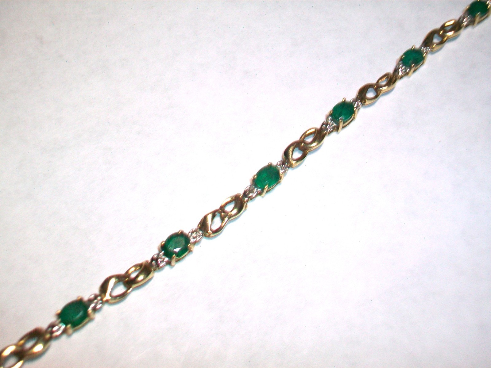 Vintage 10K Yellow Gold Oval Green Emeralds (10) Diamond (2) Bracelet 3.2 Grams