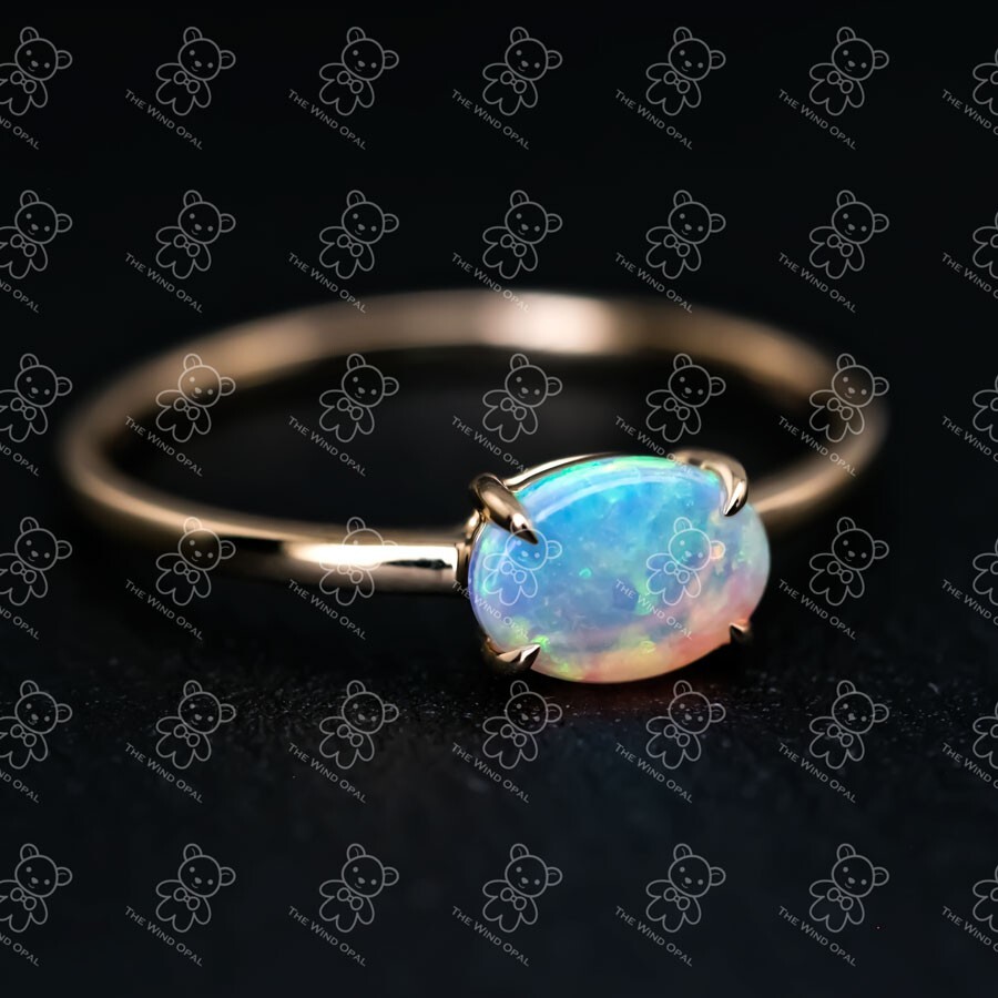18K Yellow Gold Engagement Ring featuring an Oval Shaped Australian Solid Opal