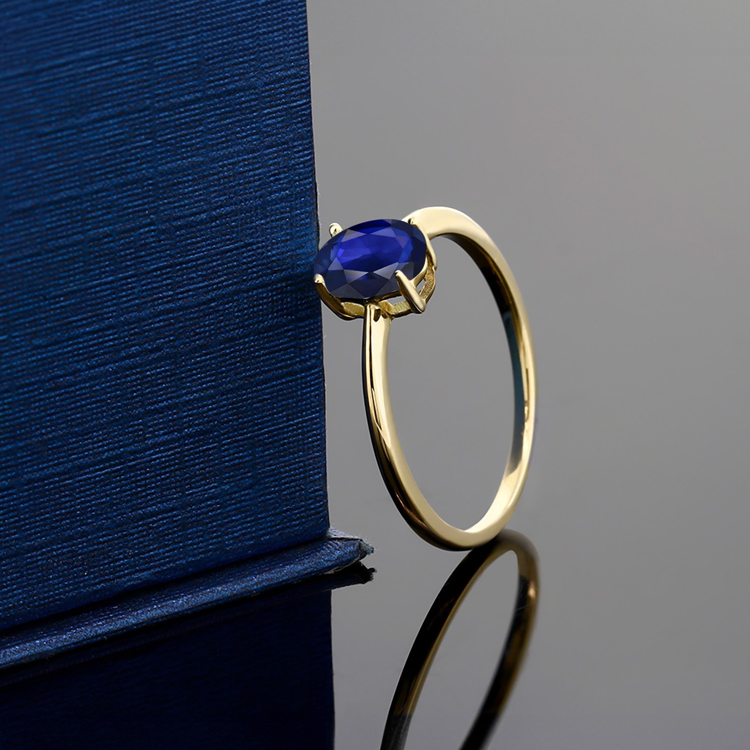 0.57 Ct Oval Blue Sapphire 10K Yellow Gold Ring