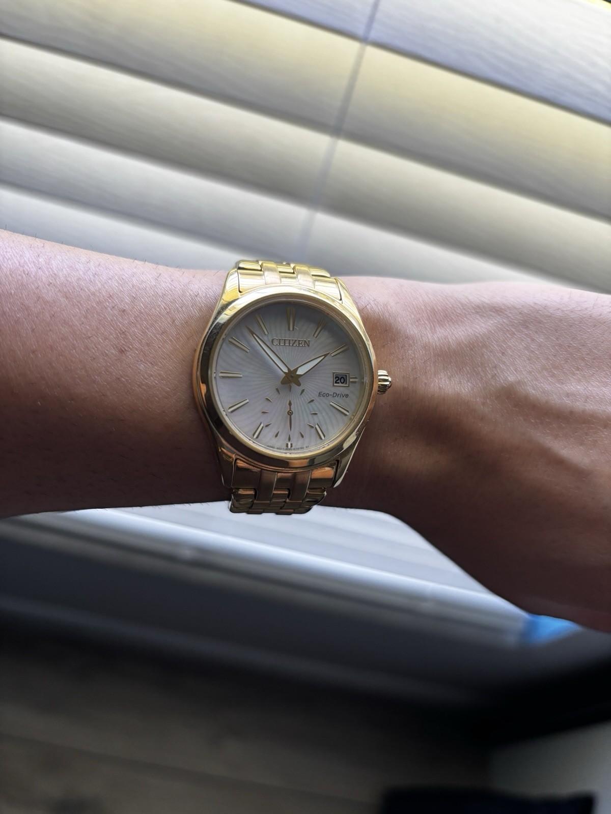 Citizen Eco-Drive Women’s Gold Tone Bracelet Watch White Dial Date Analog