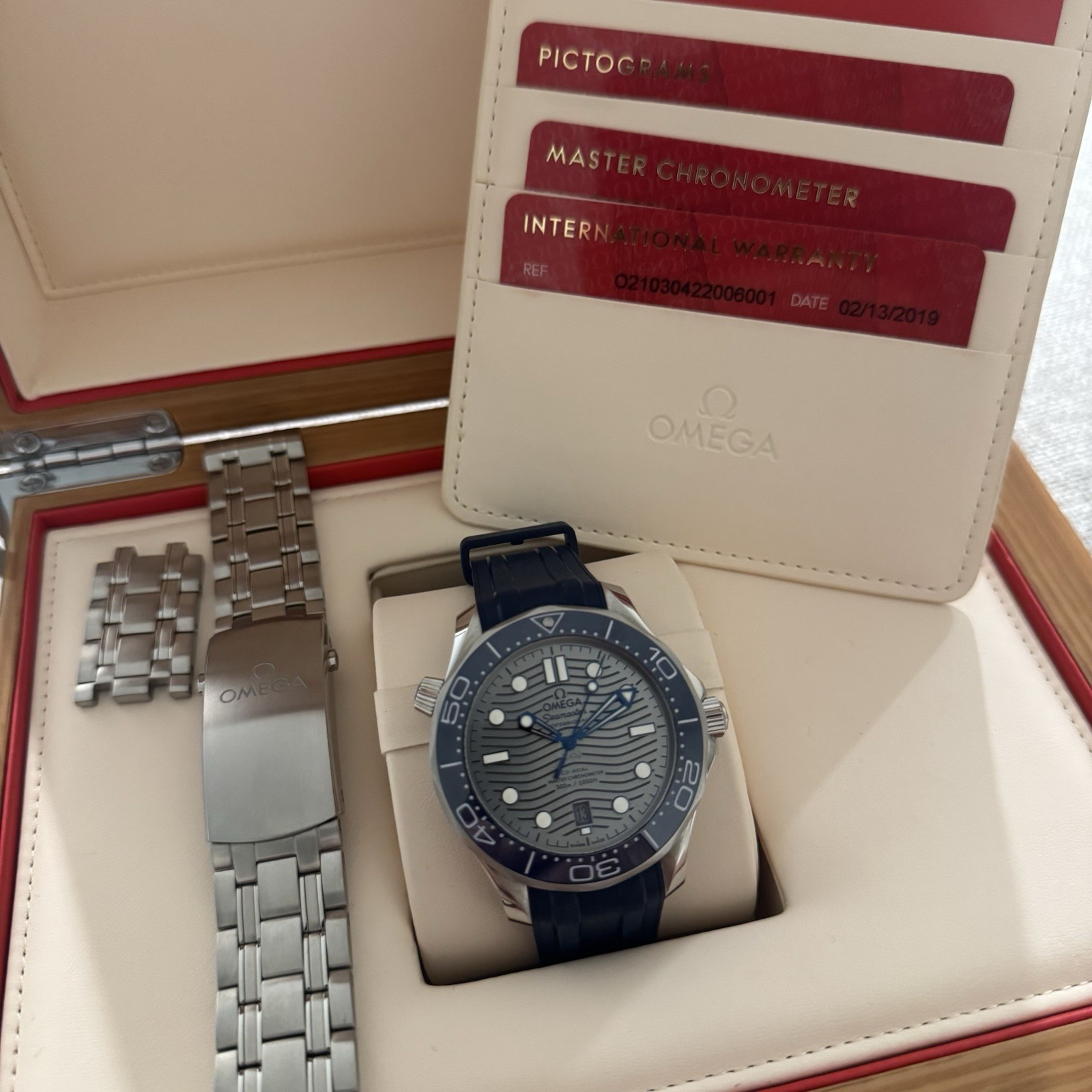 Omega Seamaster Diver 300M Gray Dial Blue Bezel 42mm Rubber & Steel Bracelet