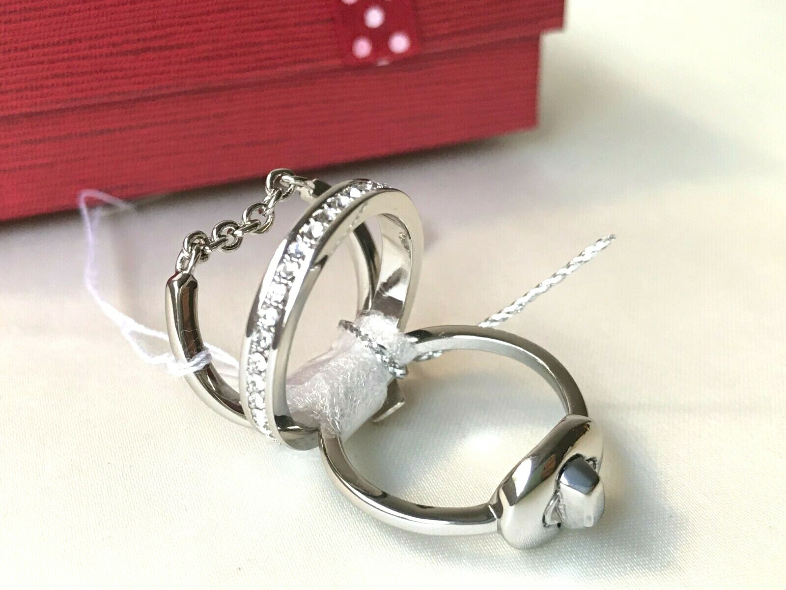 Coach pave turn-lock ring set