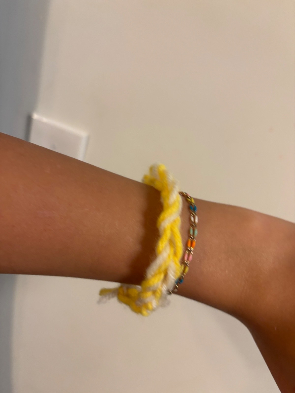 Handmade crochet yellow and white bracelet 18 stitches in width. Stretch to fit.