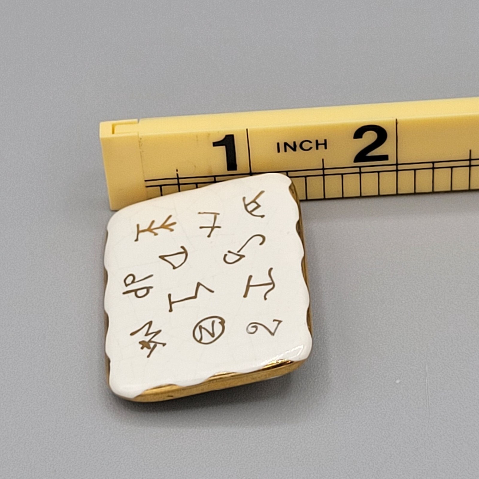 Vintage Ceramic Enamel Brooch With Ancient Symbol Design & Gold Tone Trim