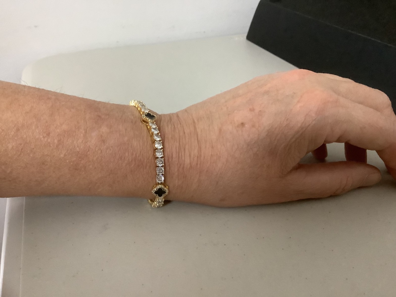 Imperium 18k gold plated CZs four leaf clover black enamel tennis bracelet 7″
