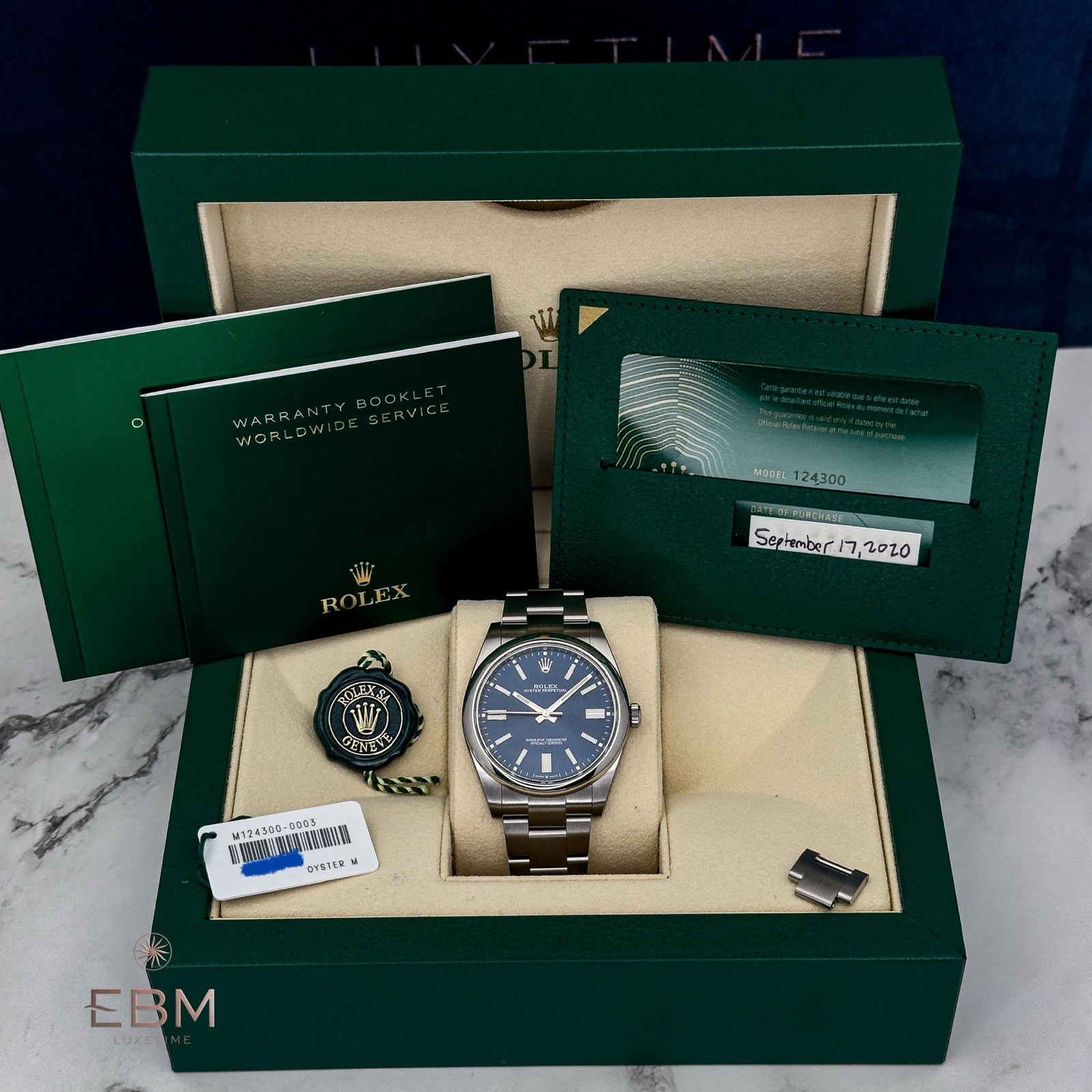 Rolex Oyster Perpetual 41 Blue Dial Ref. 124300 – Box & Papers