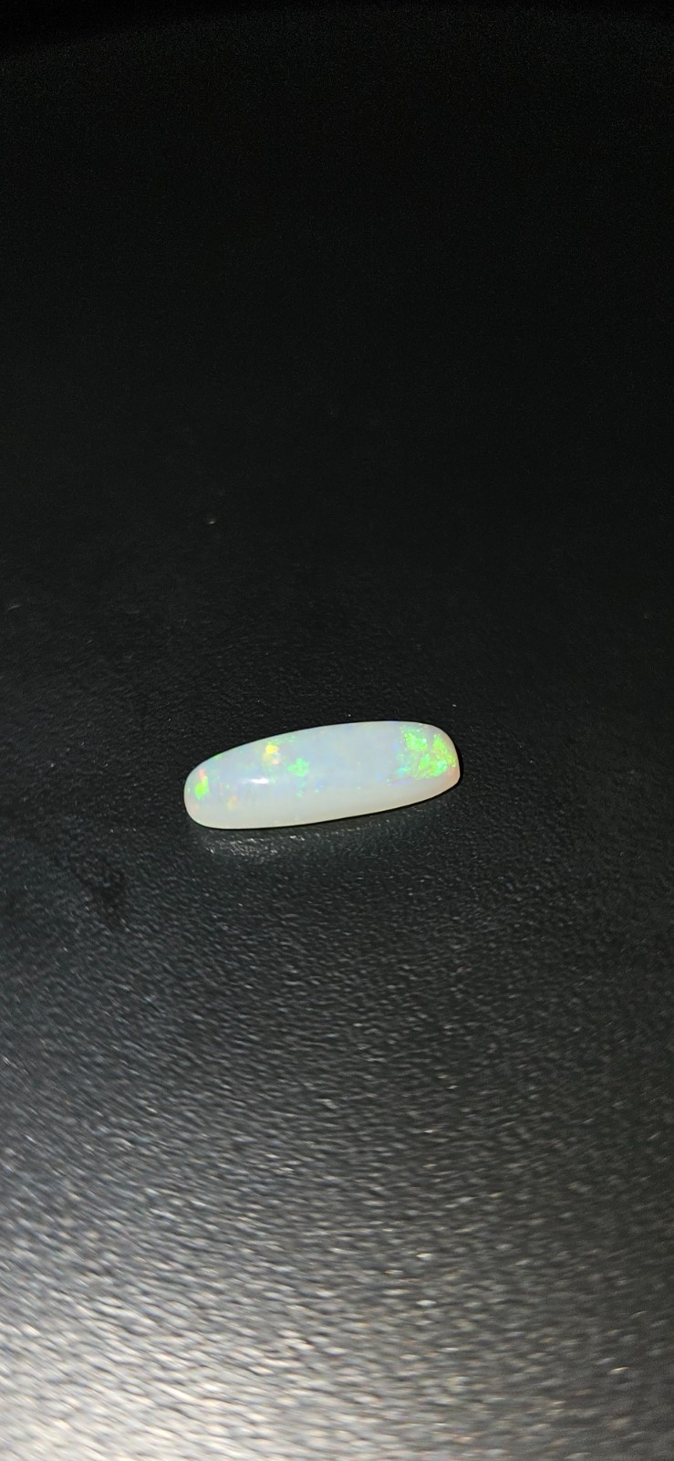 Long Cushion Cut Natural Crystal Opal. 1.18 Carats 12mm x 4mm x 3mm