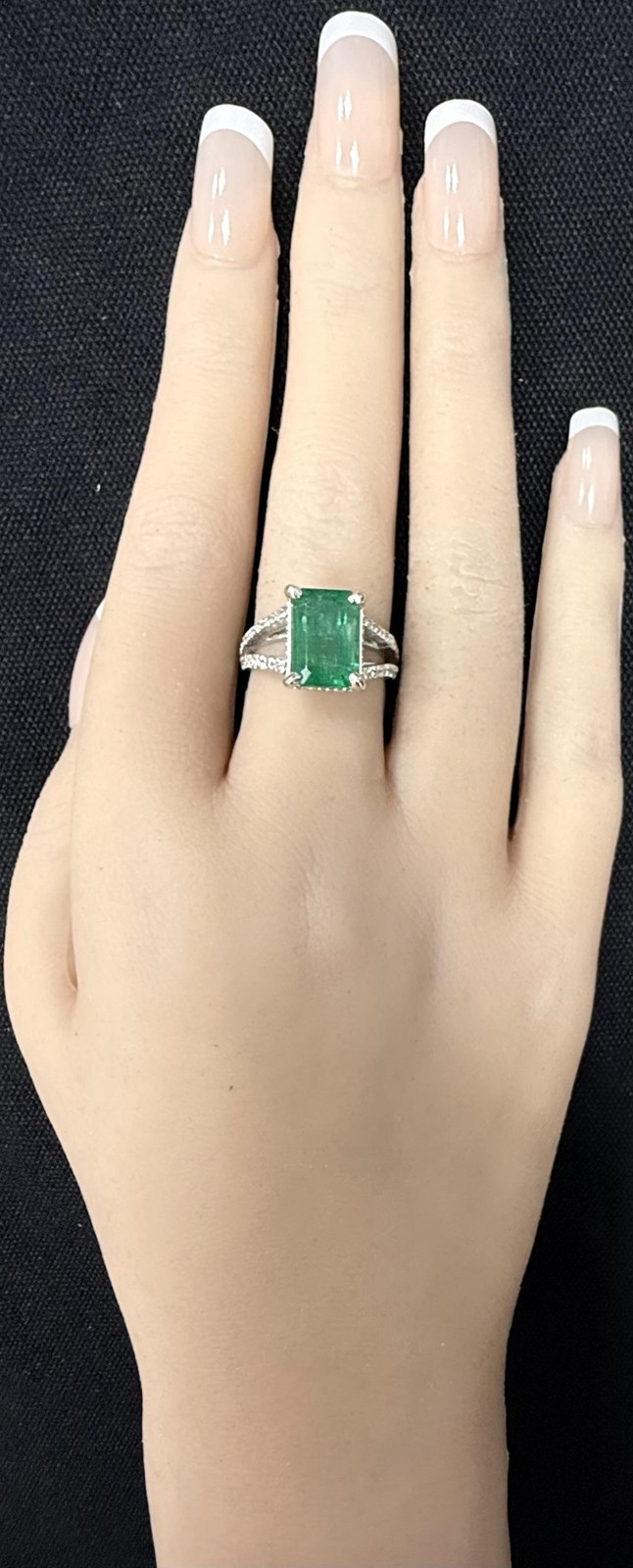 14K White Gold Emerald and Round Diamond Split Shank Open Cathedral Ring