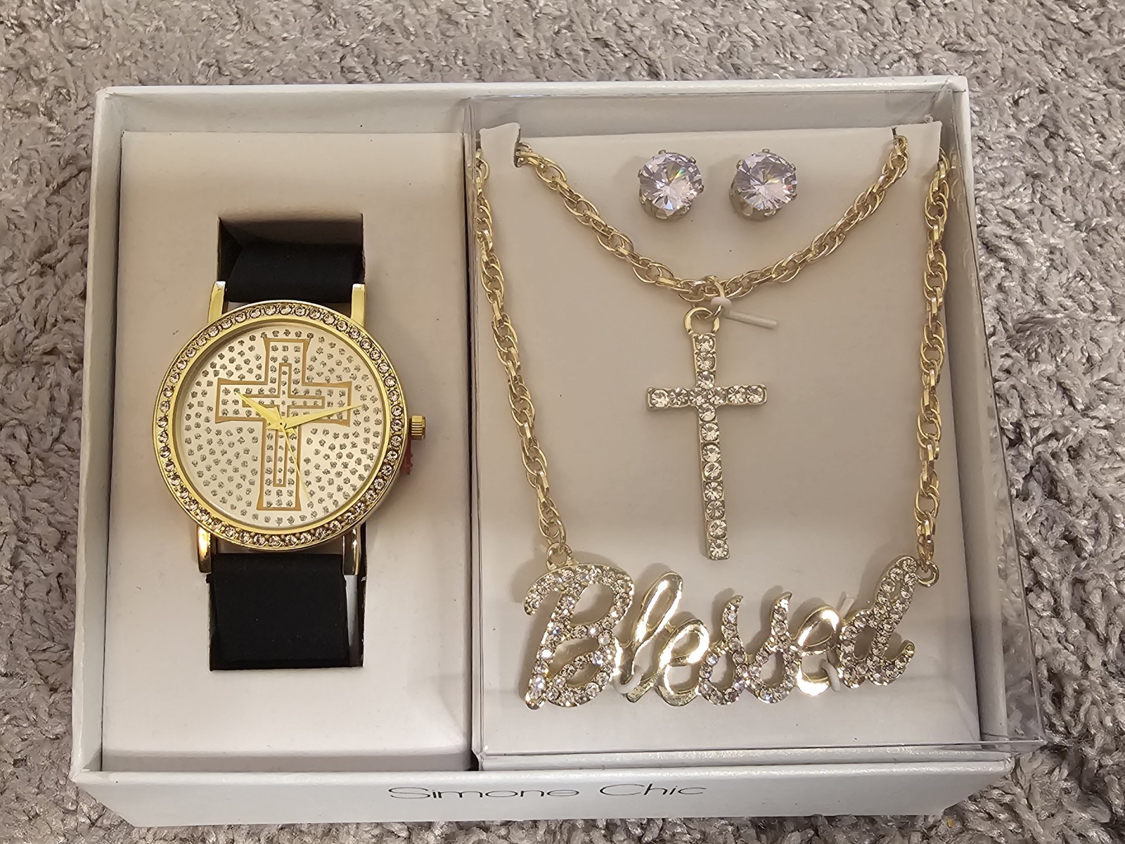 Brand new never been worn. Necklace says blessed, has a watch and earrings.