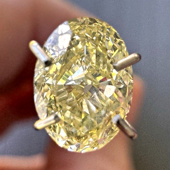 IGI Certified Lab Grown Oval Diamond 1.10ct Fancy Intense Yellow VVS2 Ex Cut