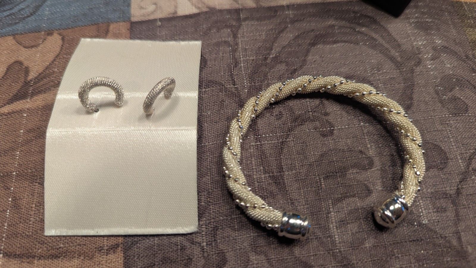 Silver Tone Twisted Bracelet And Earrings