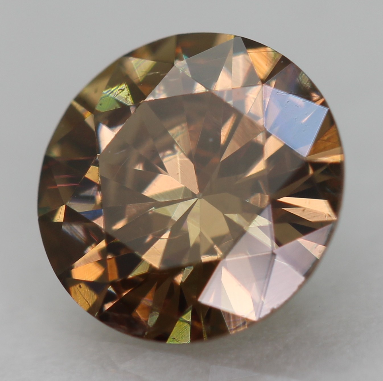 0.59 Ct Yellow Brown VVS2 Round Brilliant Natural Enhanced Diamond 5.74mm VIDEO