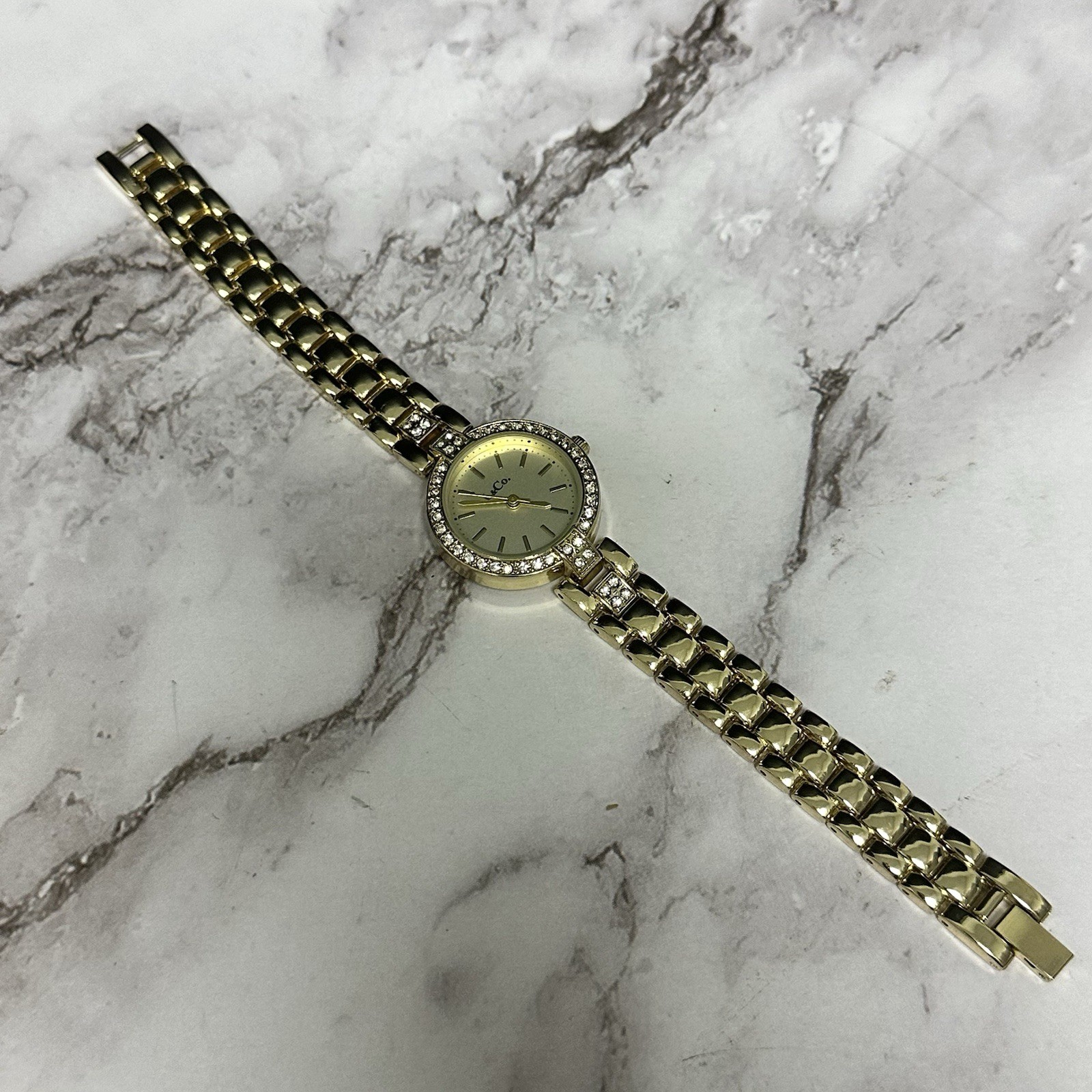 L & Co Watch Women Gold Tone Round Dial Crystal Bezel New Battery 7.25″