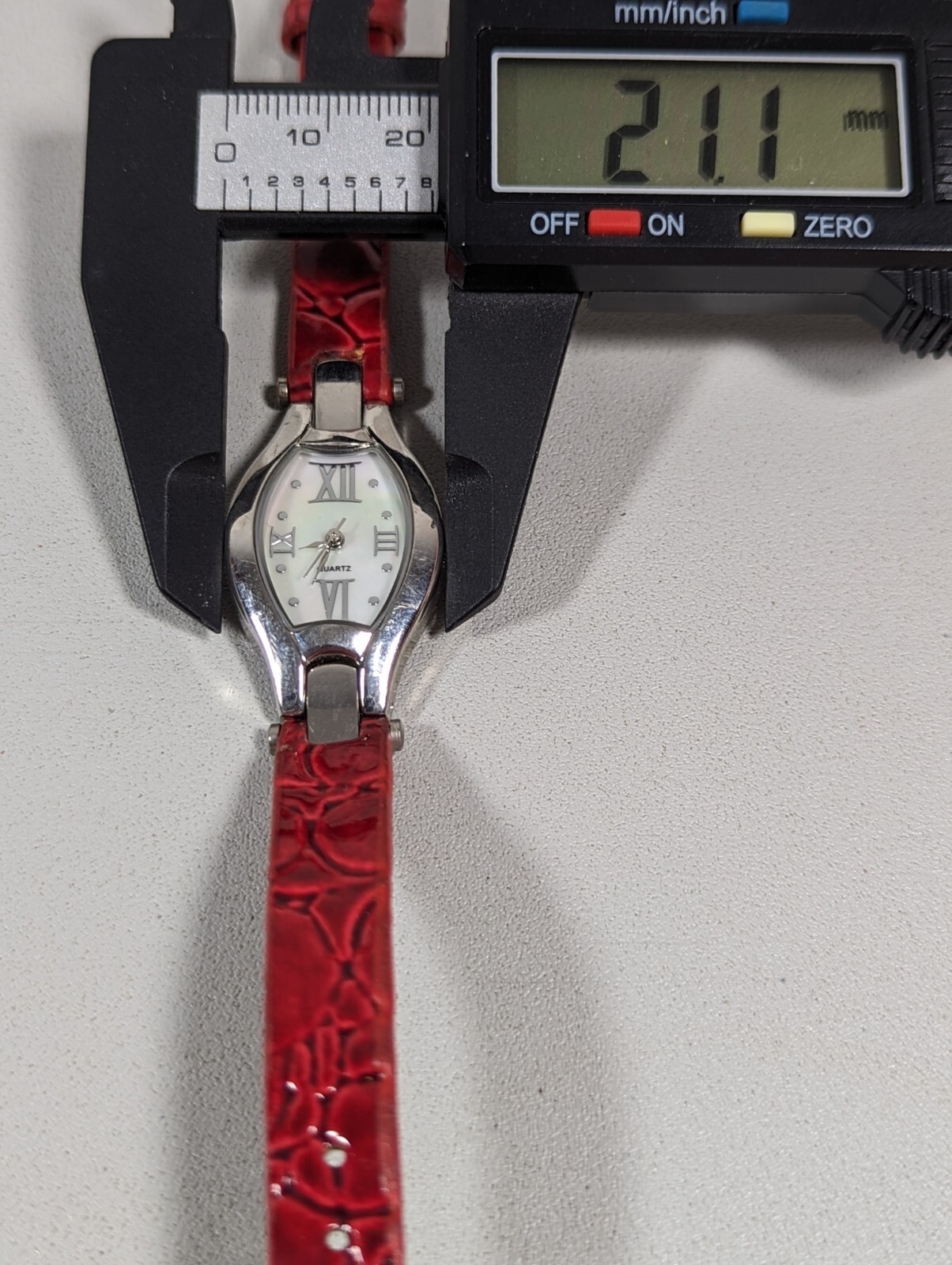 White Pearlized Dial Silver Tone Rectangle Case Red Leather Band Watch 7.25 In