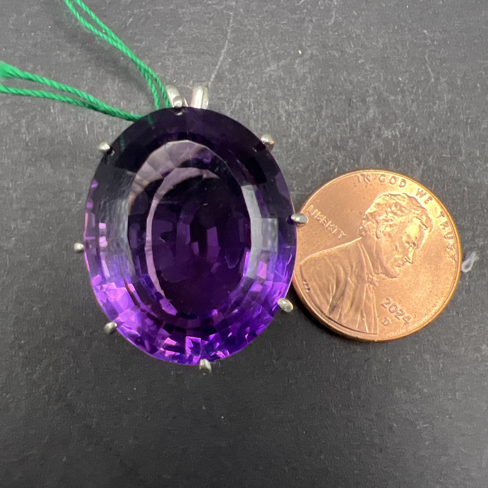 31.69 ct Amethyst and Sterling Silver Pendant. 8.8 Grams