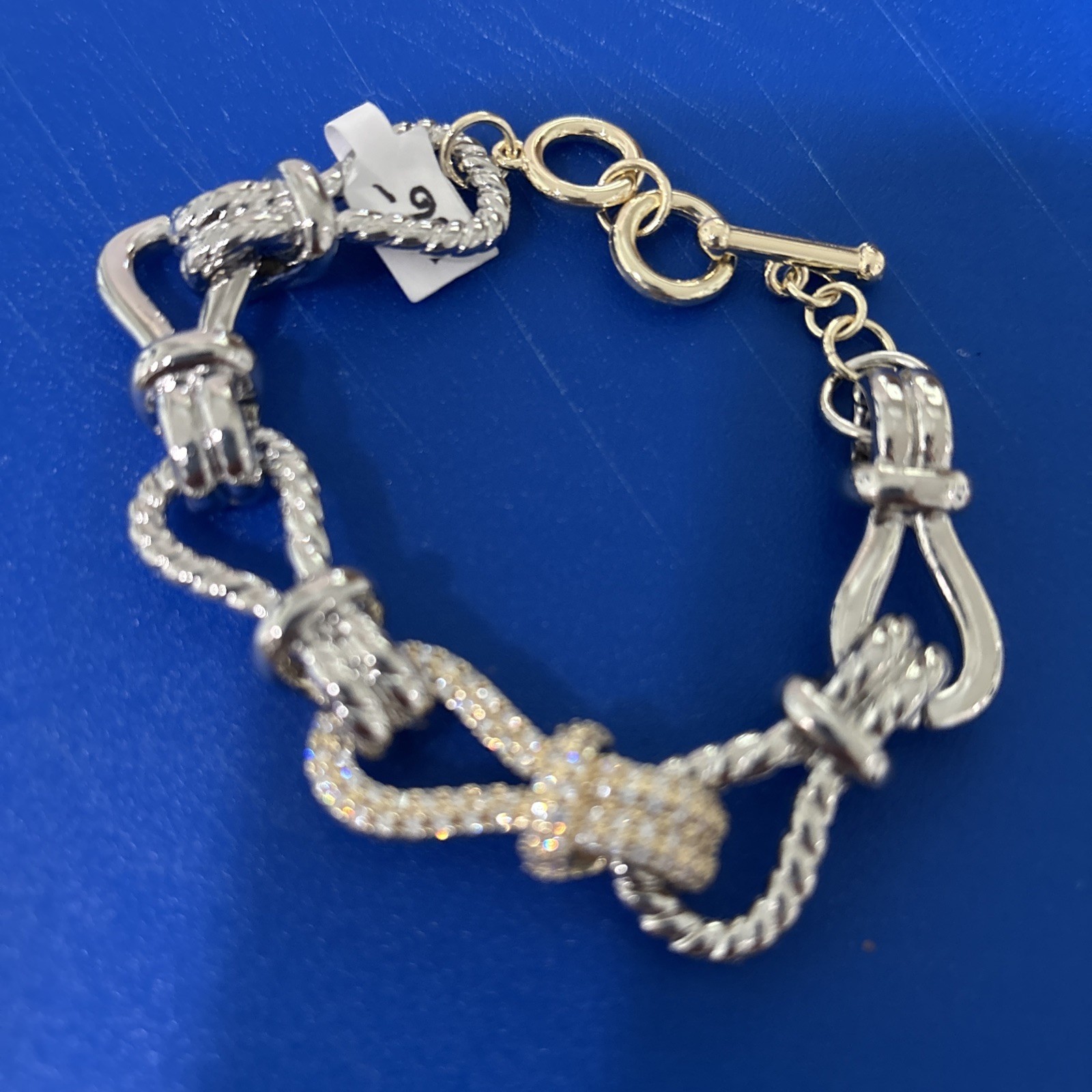 Looped Lengths Make This Bracelet Special. Adorned With Rinestones In Middle.