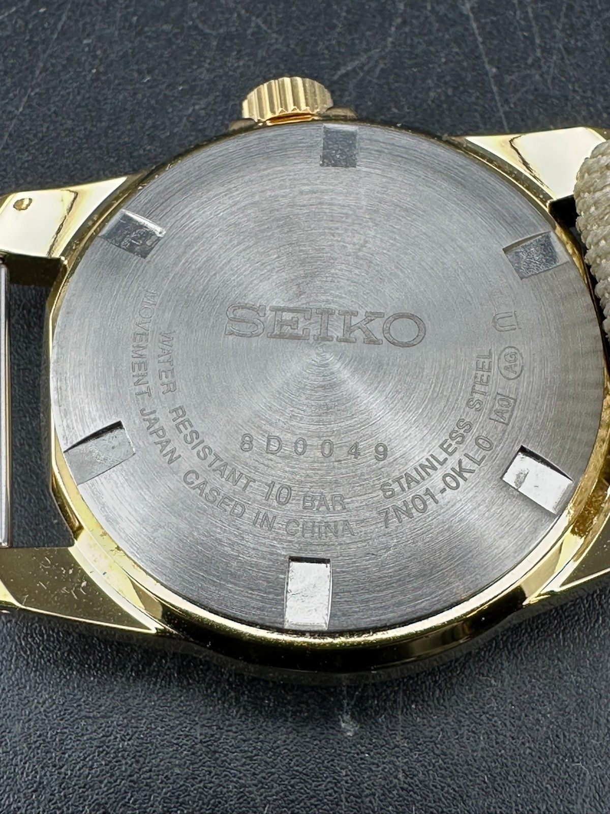 Seiko SUS Nano Universe Men’s Silver Dial Gold Tone 35mm Quartz Watch 7N01-0KL0